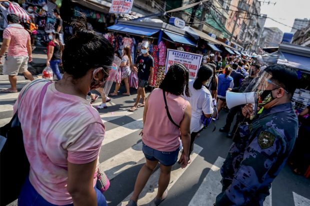People lined up at a shopping market. STORY: ‘Noche buena’ price hikes loom; DTI has some saving tips