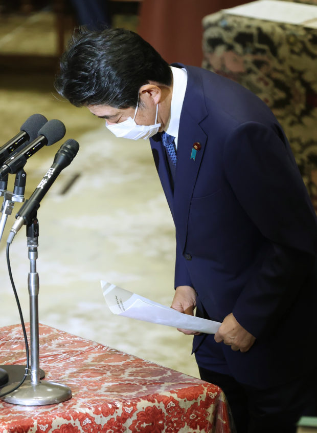 Japan ex-PM Abe faces lawmakers on scandal but avoids prosecution