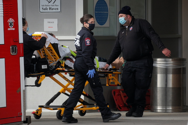 COVID-19 patient arrives outside Maimonides Medical Center in New York City