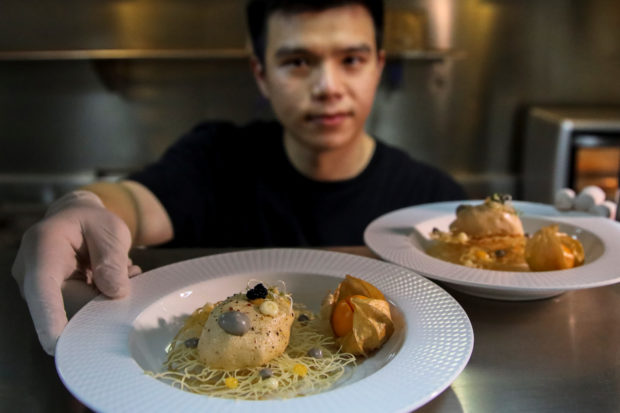 Thai researcher wonders if chicken feathers on the menu might fly