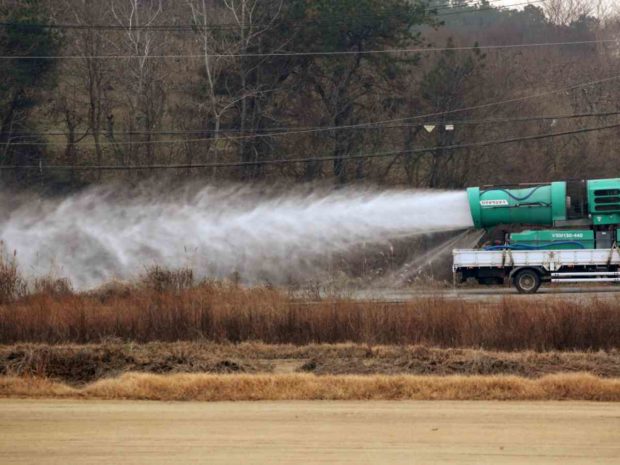 truck disinfecting duck farm in Korea