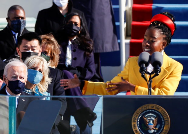Poet Amanda Gorman captures 'bruised, but whole' US at Biden, Harris inauguration