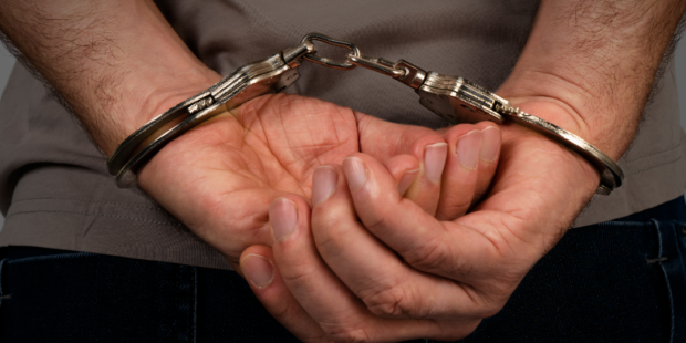 handcuffs arrest nabbed