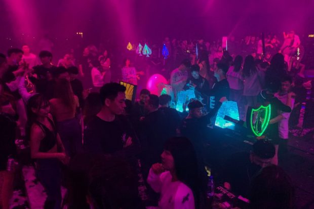 One year after lockdown, Wuhan clubbers hit the dance floor