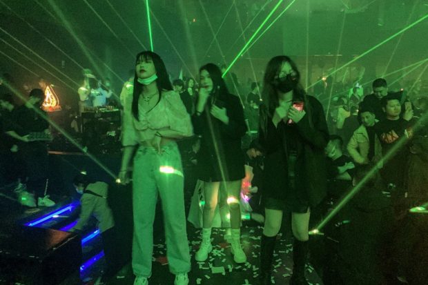 One year after lockdown, Wuhan clubbers hit the dance floor