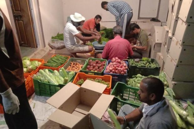 vegetables being sorted Mumbai India