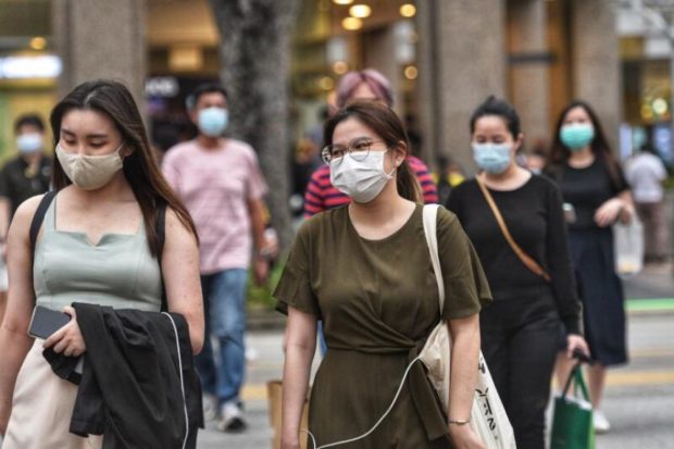 people wearing masks singapore