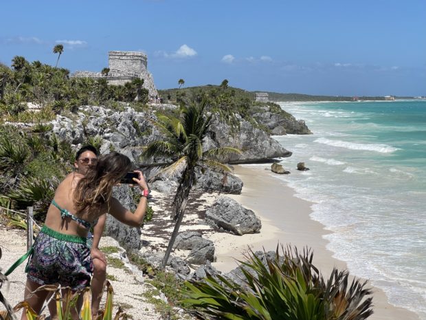 Tourists writhe their bodies to pumping techno beats on dance floors along Mexico's Caribbean coast -- a magnet for people from around the world who want to party during a pandemic.
