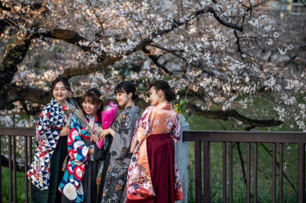Sakura selfies: Tokyo enjoys cherry blossoms despite virus warning