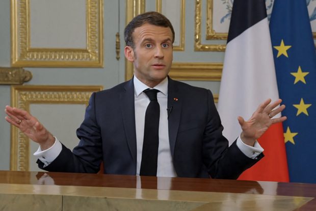 French President Emmanuel Macron gives an interview at the Elysee Palace in Paris on March 23, 2021 to the show "C Dans l'Air" on the French tv channel France 5 ahead of the broadcast of a documentary on France's diplomatic relations with Turkey