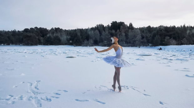 Russian ballerina performs Swan Lake on ice to save bay
