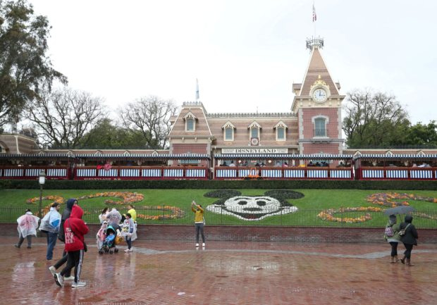 Walt Disney Co's two theme parks in California will reopen on April 30 to a limited number of guests, the company said on Wednesday, over a year after they closed because of the C