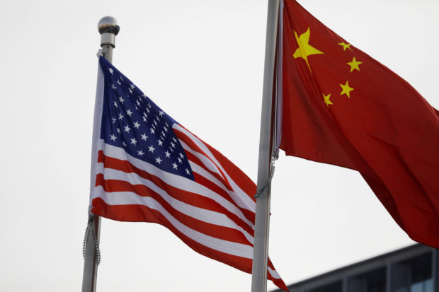 U.S. tells China it does not seek conflict, but will stand up for principles, friends
