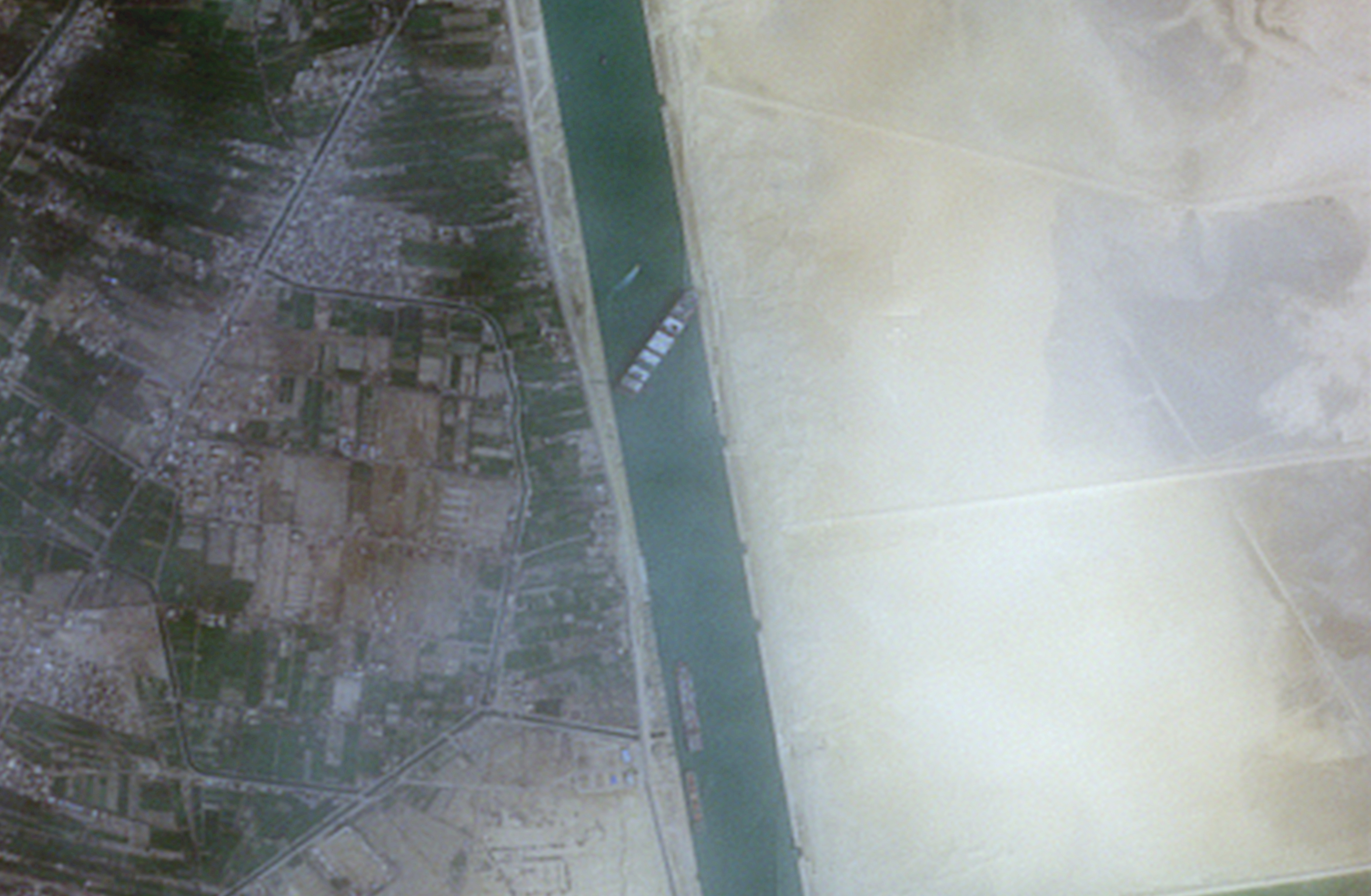 A closer view of the 400-meter, 224,000-tonne Ever Given container ship, leased by Taiwan's Evergreen Marine Corp, seen blocking the Suez Canal in this European Space Agency Copernicus Sentinel-2 satellite Image
