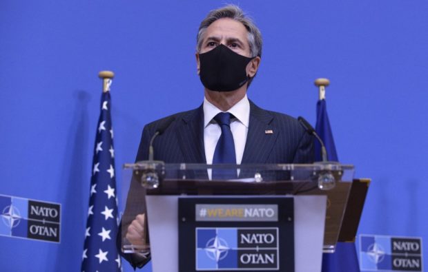 US Secretary of State Antony Blinken holds a  joint news conference with the NATO secretary general and US secretary of Defense  on April 14, 2021 at the NATO headquarters in Brussels, following a meeting after the United States announced the withdrawal of all its troops from the Afghanistan by September 11. - US Secretary of State Antony Blinken said on April 14, 2021 that the moment has come to withdraw troops from Afghanistan and that Washington would work with NATO allies on a "coordinated" pull-out. NATO allies agreed to start withdrawing of their forces from Afghanistan by May 1