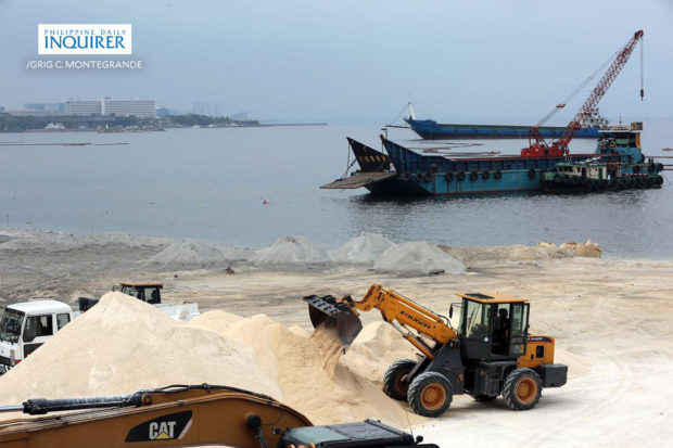 LOOK: Dolomite sand poured again over Manila Bay 'white beach ...