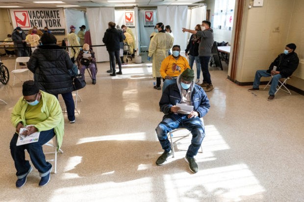 Residents of William Reid Apartments rest for a few minutes after receiving the first dose of the COVID-19 vaccine at a pop-up vaccination site in the NYCHA housing complex in Brooklyn, New York City, U.S., January 23, 2021.