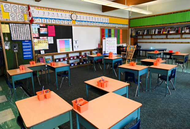A grade two classroom awaits students at Hunter's Glen Junior Public School, part of the Toronto District School Board (TDSB), a day before classes reopen for the first time since the beginning of the coronavirus disease (COVID-19) pandemic in Scarborough, Ontario, Canada September 14, 2020. Nathan Denette/Pool via REUTERS