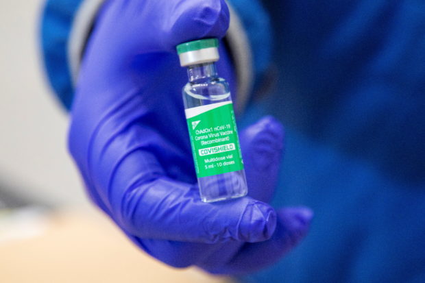 A vial of some of the first 500,000 of the 2-million AstraZeneca coronavirus disease (COVID-19) vaccine doses that Canada has secured through a deal with the Serum Institute of India in partnership with Verity Pharma at a facility in Milton, Ontario, Canada March 3, 2021.  