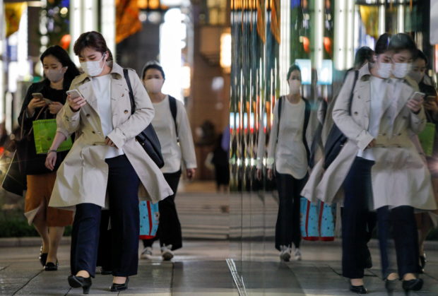 Japan to issue 'short, powerful' state of emergency for Tokyo, elsewhere