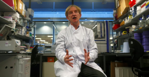 Professor Adrian Hill to members of the media at The Jenner Institute in Oxford, England January 16, 2015. REUTERS/Eddie Keogh/File Photo