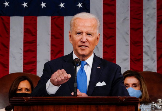 U.S. President Joe Biden addresses to a joint session of Congress in the House chamber of the U.S. Capitol in Washington, U.S., April 28, 2021.  Melina Mara/Pool via REUTERS