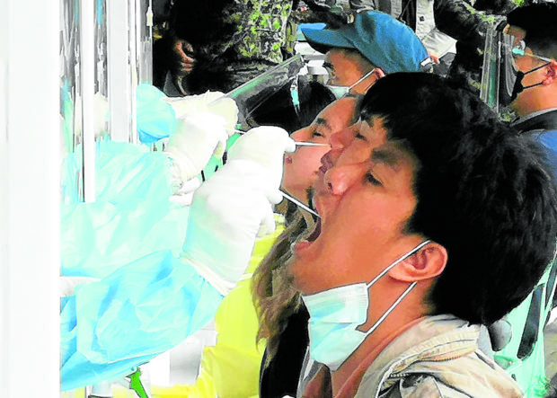 ACCESSIBLE Government and health officials in Baguio City have made COVID-19 testing accessible to residents and workers as the summer capital sees infections increasing. —EV ESPIRITU