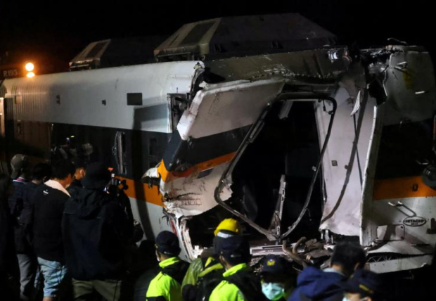 Taiwan rescuers work to bring out last body from wrecked train