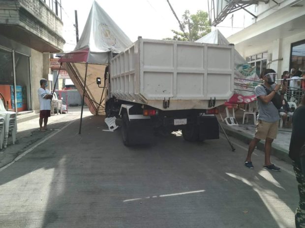 Truck rams tent with people queuing up for financial aid in Bulacan; 1 dead, 4 hurt