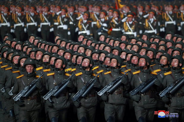 Troops march during a military parade to commemorate the 8th Congress of the Workers' Party in Pyongyang, North Korea January 14, 2021 in this photo supplied by North Korea's Central News Agency (KCNA). KCNA via REUTERS