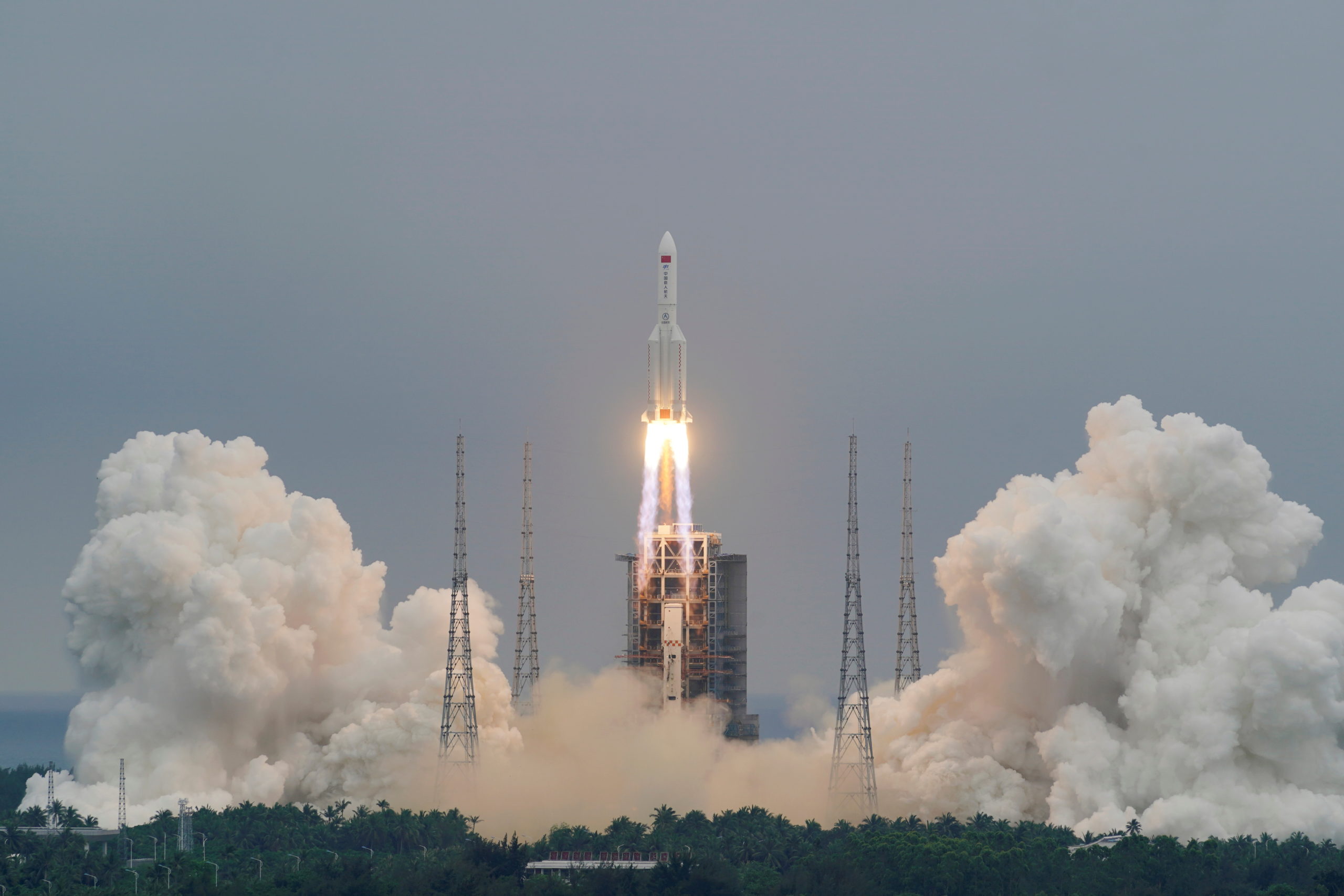 FILE PHOTO: The Long March-5B Y2 rocket, carrying the core module of China's space station Tianhe, takes off from Wenchang Space Launch Center in Hainan province, China