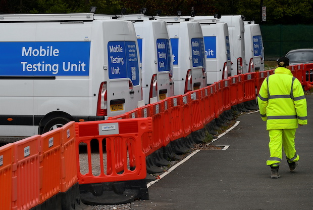 Coronavirus disease (COVID-19) mobile testing vehicles are seen parked at a depot in London, Britain