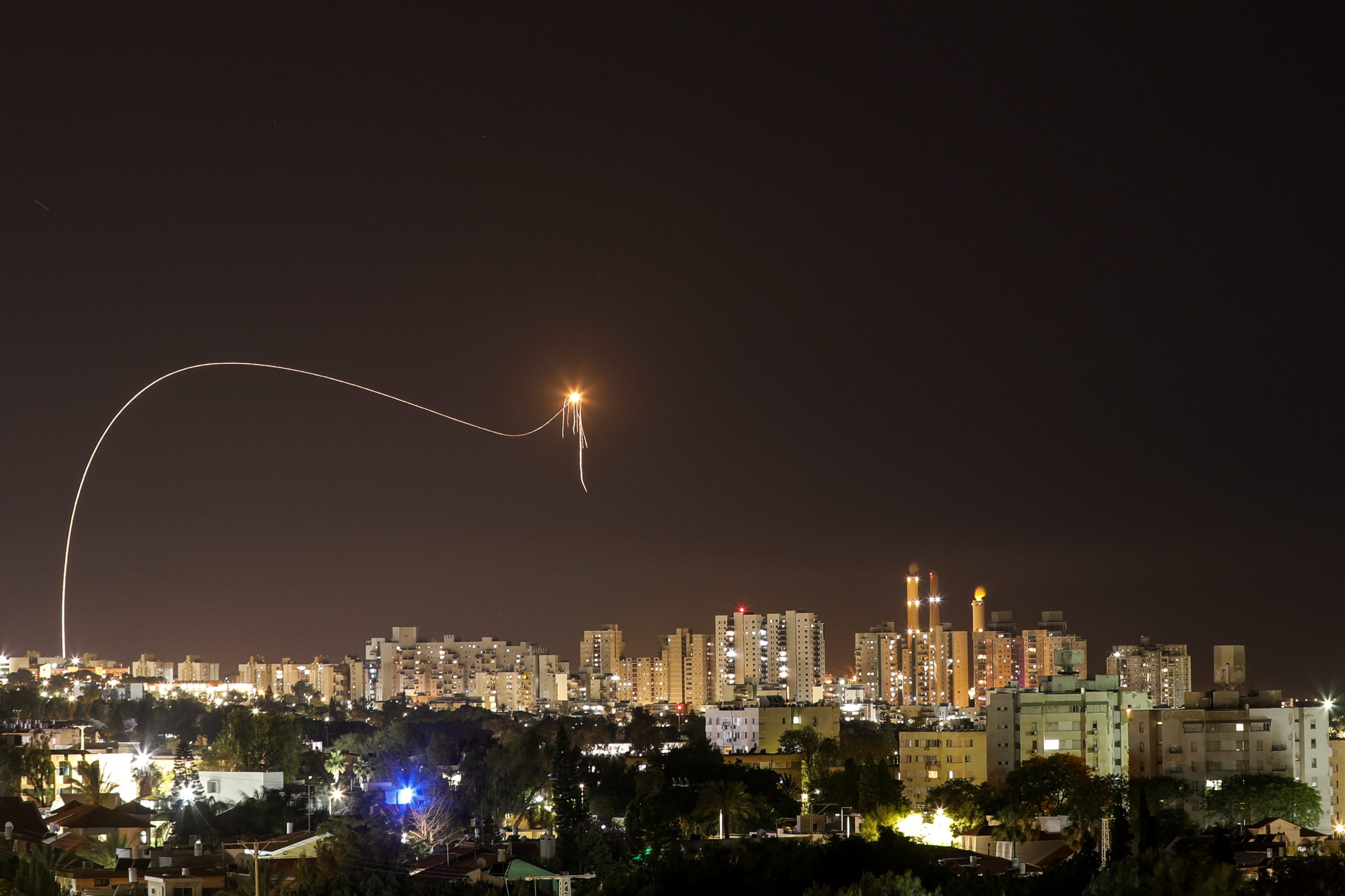 A streak of light is seen as Israel's Iron Dome anti-missile system intercepts rockets launched from the Gaza Strip towards Israel, as seen from Ashkelon, Israel May 16, 2021. REUTERS/Amir Cohen