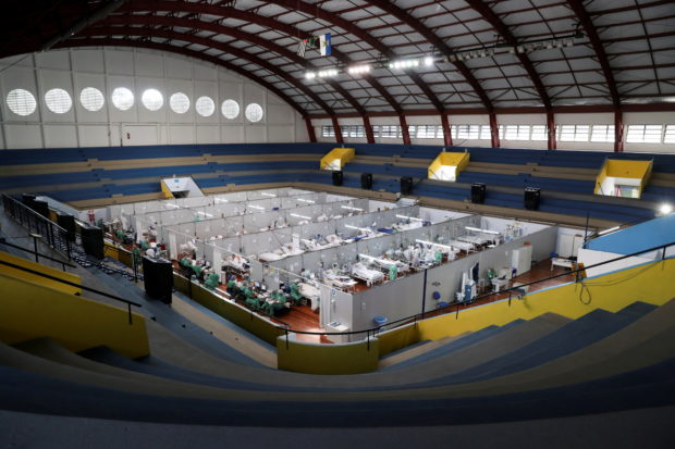 Patients suffering from the coronavirus disease (COVID-19) are treated at a field hospital set up at Dell'Antonia sports gym in Santo Andre, on the outskirts of Sao Paulo, Brazil April 7, 2021