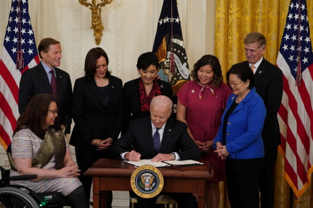'Silence is complicity': Biden signs COVID hate crimes bill into law