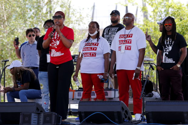 Members of George Floyd's family stand on stage during an event on the first anniversary of his death, in Minneapolis, Minnesota, U.S. May 25, 2021