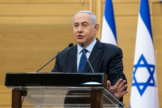 Israel Prime Minister Benjamin Netanyahu delivers a statement in the Knesset, the Israeli Parliament, in Jerusalem