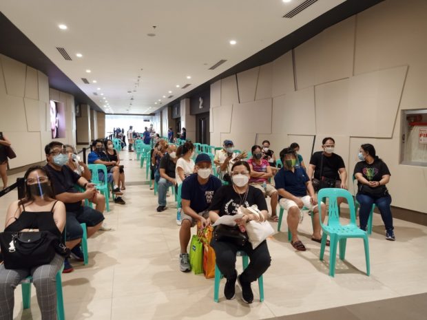 Parañaque City Public Information Office The local government of Parañaque City rolls out the Pfizer COVID-19 vaccine for health workers, senior citizens and persons with comorbidities at a mall in Barangay Tambo, Parañaque City.