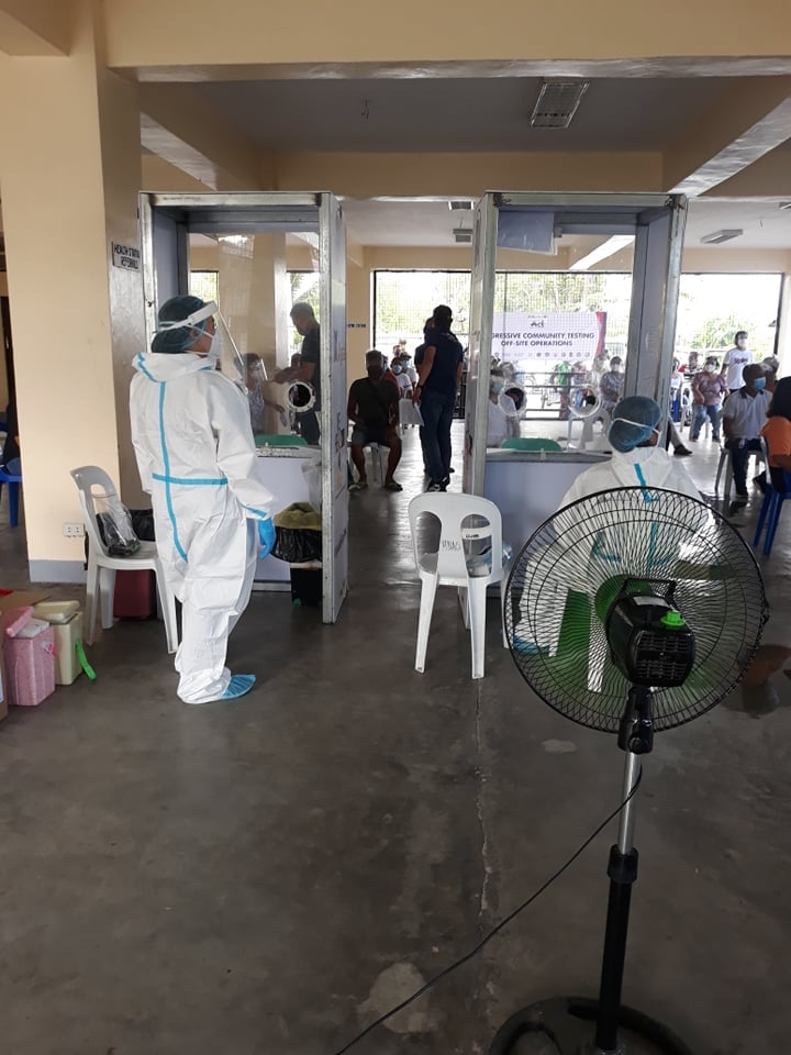 Personnel of the Department of Health prepare to conduct RT-PCR test to frontliners, essential workers and kin of COVID-19 patients in Baler town, Aurora province. (Photo from the Municipal Government of Baler) swab test
