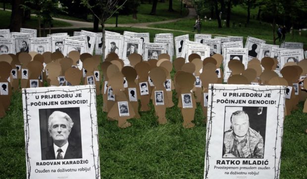 A picture taken on May 31, 2021 in the area of Northern-Bosnian town of Prijedor shows an installation commemorating victims of 1992 ethnic cleansing conducted by Bosnian Serb armed forces. - Bosnian Serb wartime military chief Ratko Mladic currently awaits the final verdict upon his appeal. The Hague-based tribunal in 2017 found the former general guilty of genocide and war crimes, notably the Srebrenica massacre and the siege of Sarajevo. 