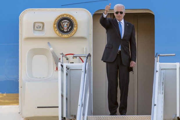 US president Joe Biden is about to board Air Force One Boeing 747 airplane after the US - Russia summit with Russian President Vladimir Putin, on Geneva Airport Cointrin, on June 16, 2021. (Photo by MARTIAL TREZZINI / POOL / AFP)