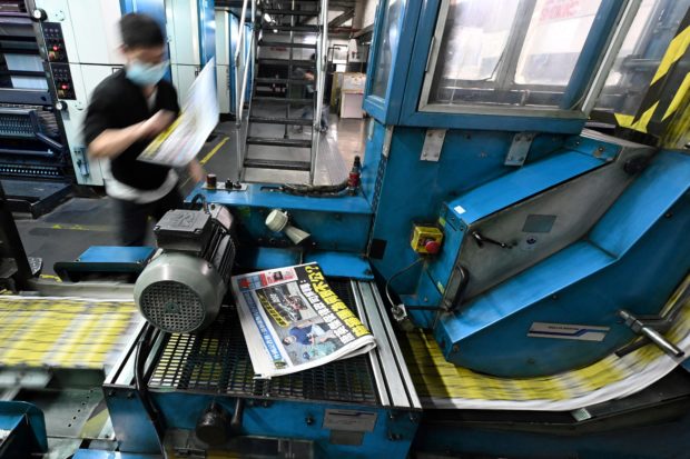 Hong Kong pro-democracy paper Apple Daily confirms closure