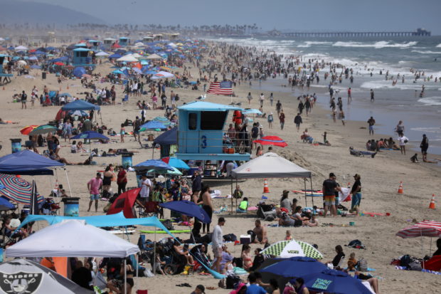 People flock to the beach to enjoy the Memorial Day long weekend, in Santa Monica, California, U.S. May 30, 2021
