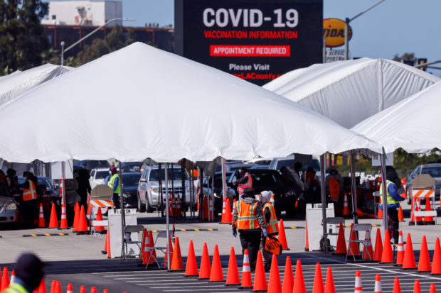A large vaccination site is shown as people with preexisting health conditions are granted access to a vaccination during the outbreak of the coronavirus disease (COVID-19) in Inglewood, California, U.S.,
