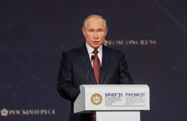Russian President Vladimir Putin delivers a speech during a session of the St. Petersburg International Economic Forum (SPIEF) in Saint Petersburg, Russia, June 4, 2021. Anatoly Maltsev/Pool via REUTERS