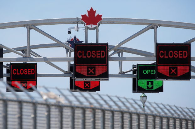 A Canadian maple leaf is seen on The Peace Bridge, which runs between Canada and the United States, over the Niagara River in Buffalo, New York, U.S. July 15, 2020. REUTERS/Brendan McDermid/File Photo