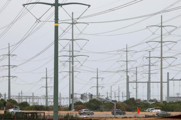 Power lines are shown as California consumers prepare for more possible outages following weekend outages to reduce system strain during a brutal heat wave amid the outbreak of coronavirus disease (COVID-19) in Carlsbad, California, U.S., August 17, 2020. REUTERS/Mike Blake
