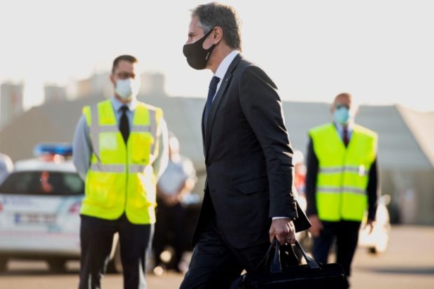 U.S. Secretary of State Antony Blinken walks to his car after disembarking from his airplane upon arrival ahead of the NATO Summit at Brussels Airport in Belgium, June 12, 2021. Saul Loeb/Pool via REUTERS