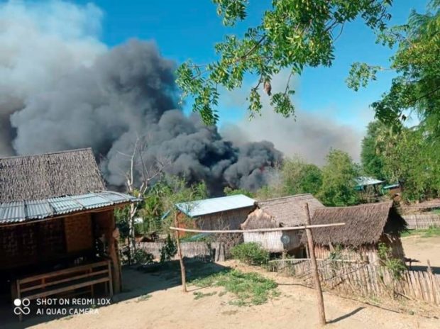 A view shows smoke from the fire in Kin Ma Village, Pauk Township, Magway Region, Myanmar June 16, 2021, in this picture obtained by Reuters from social media.