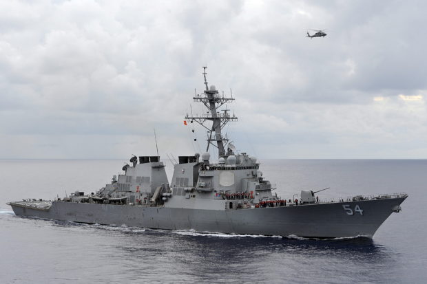 The U.S. Navy guided-missile destroyer USS Curtis Wilbur patrols in the Philippine Sea in this August 15, 2013 file photo